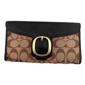 Coach women’s wallet 8 but 4 approximately inches.